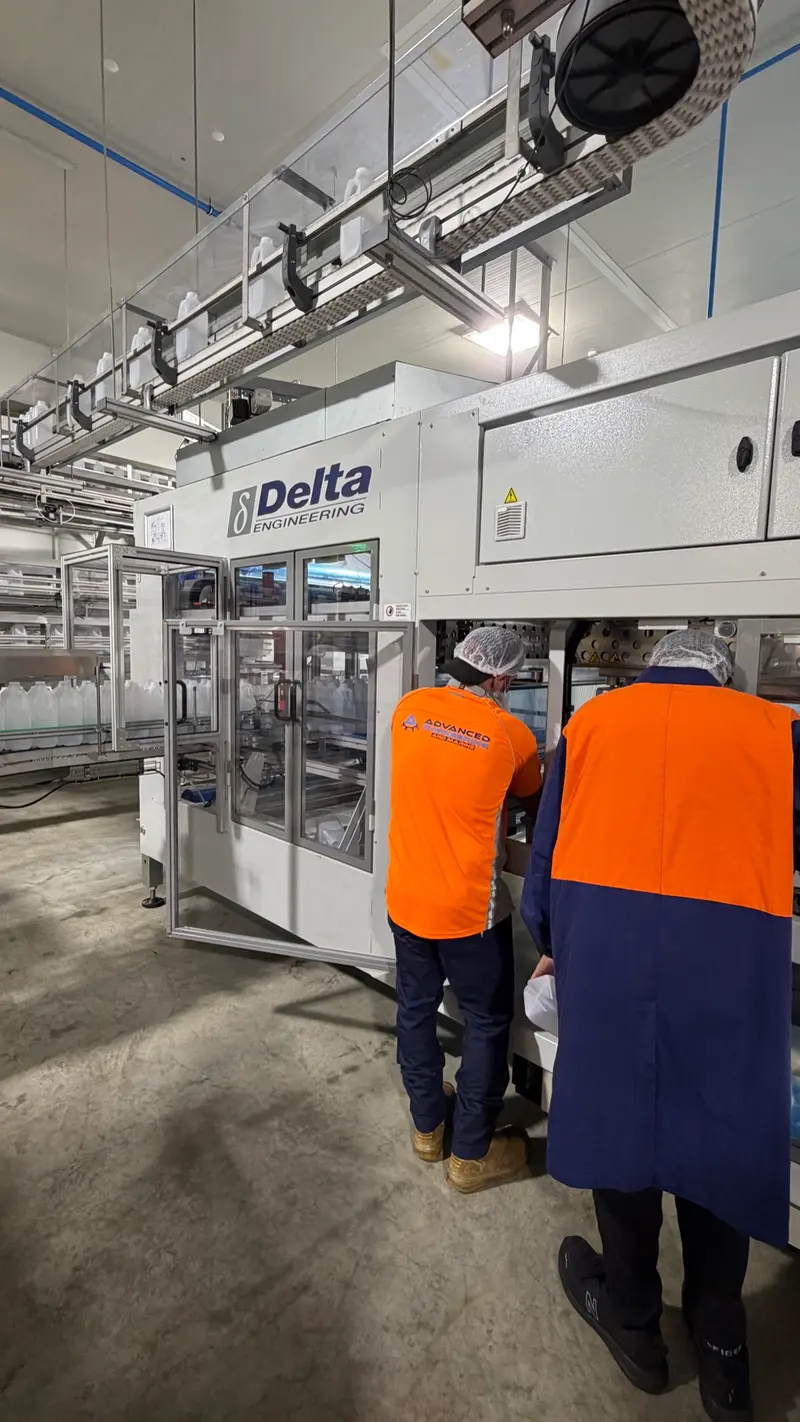 AEM team servicing production line machinery on-site